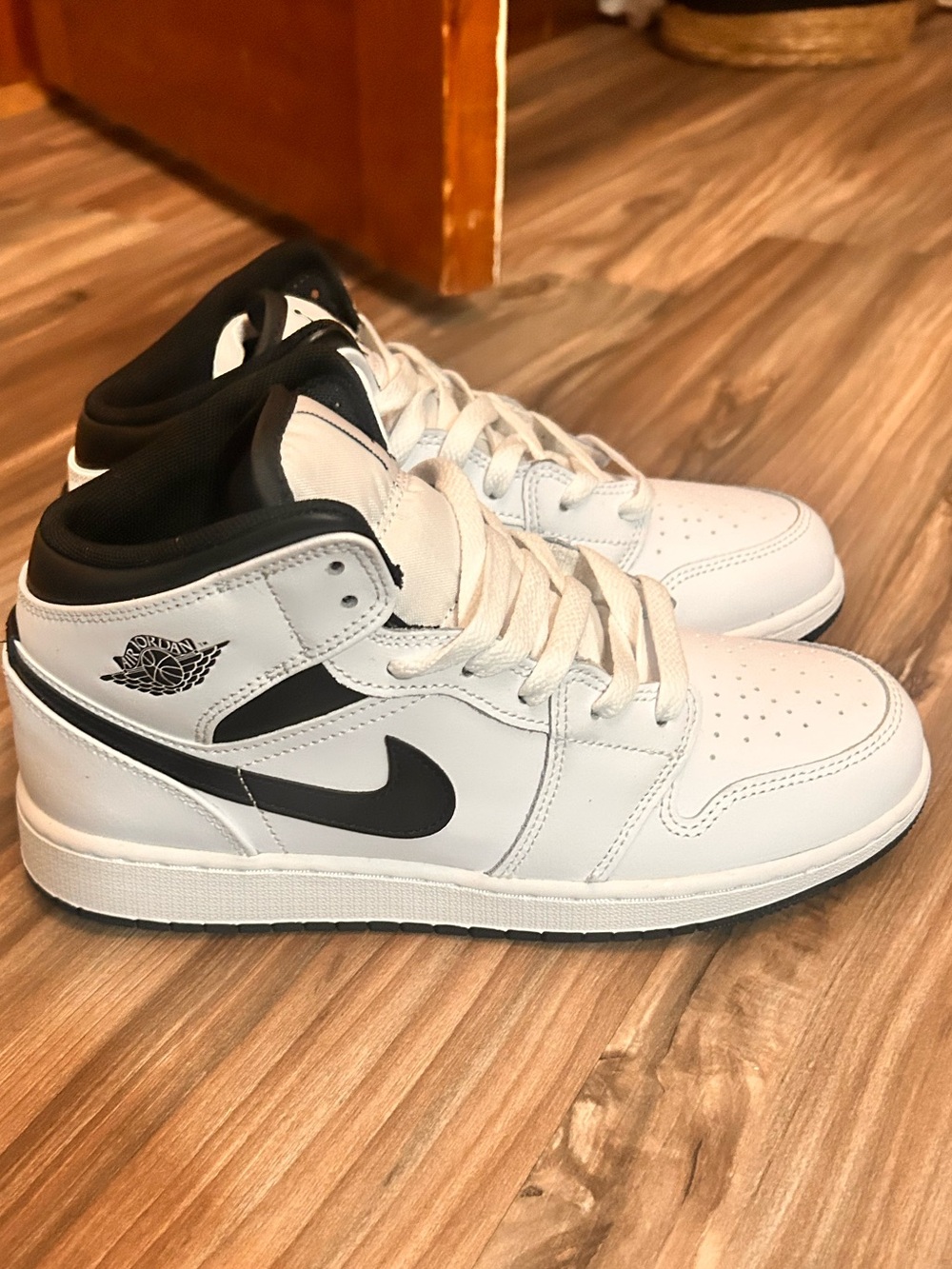 Nike Mid-Top Sneakers in White and Black